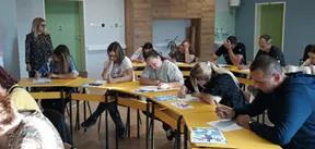 A group of teachers at a workshop